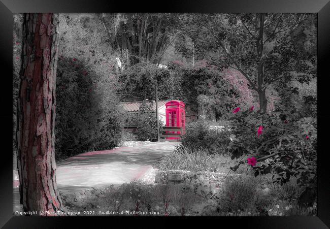 Red telephone box in the botanical gardens Gibralt Framed Print by Piers Thompson
