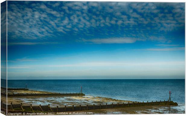 Groynes at Silloth Cumbria Canvas Print by Angela Wallace