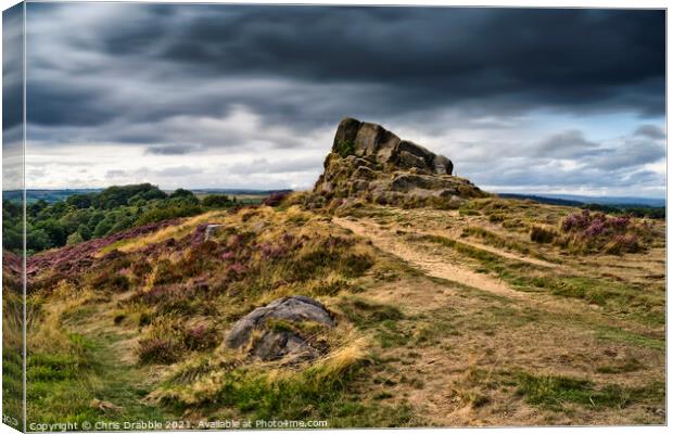 Ashover Stone and  moving clouds (2) Canvas Print by Chris Drabble
