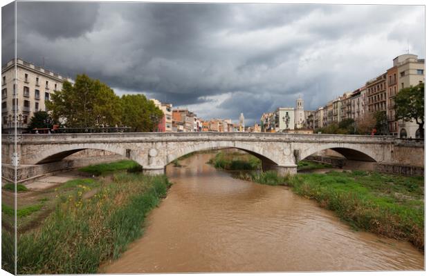 Stone Bridge on River Onyar in Girona Canvas Print by Artur Bogacki