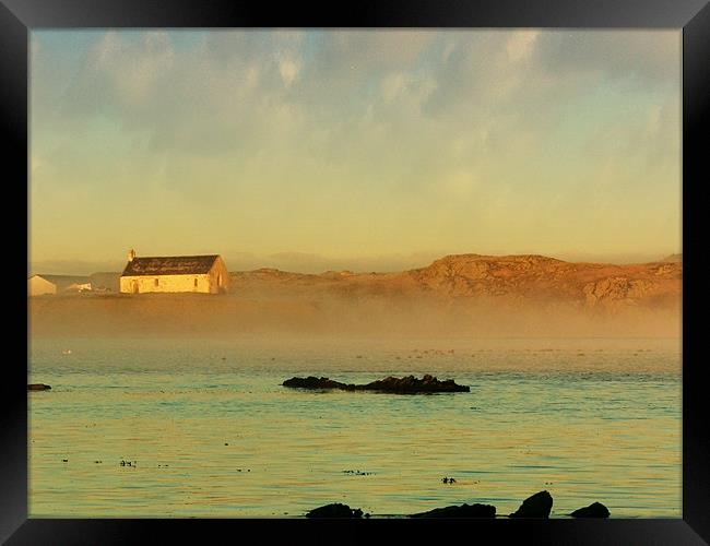 Morning mist on Cwyfan Bay Framed Print by Ian Tomkinson