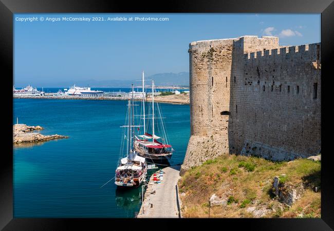Boats moored next Kyrenia Castle, Northern Cyprus Framed Print by Angus McComiskey