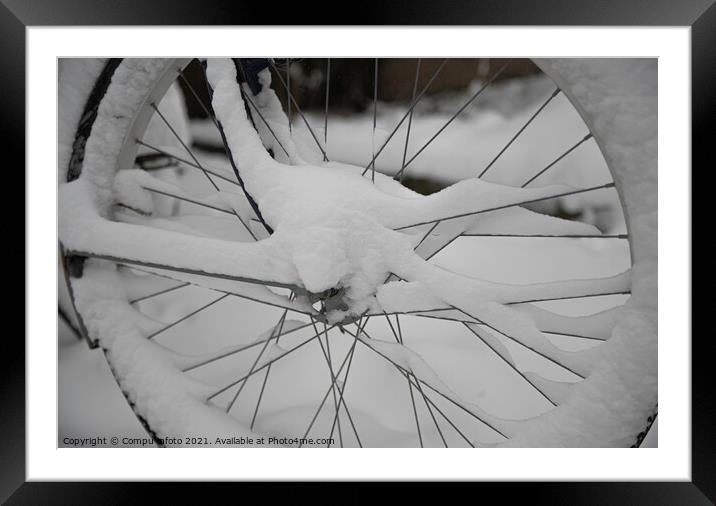 bike in the snow in winter  Framed Mounted Print by Chris Willemsen
