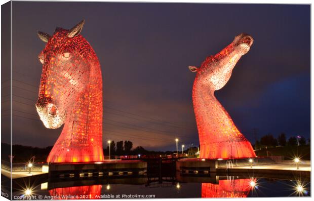 illuminated Kelpies with reflection Canvas Print by Angela Wallace
