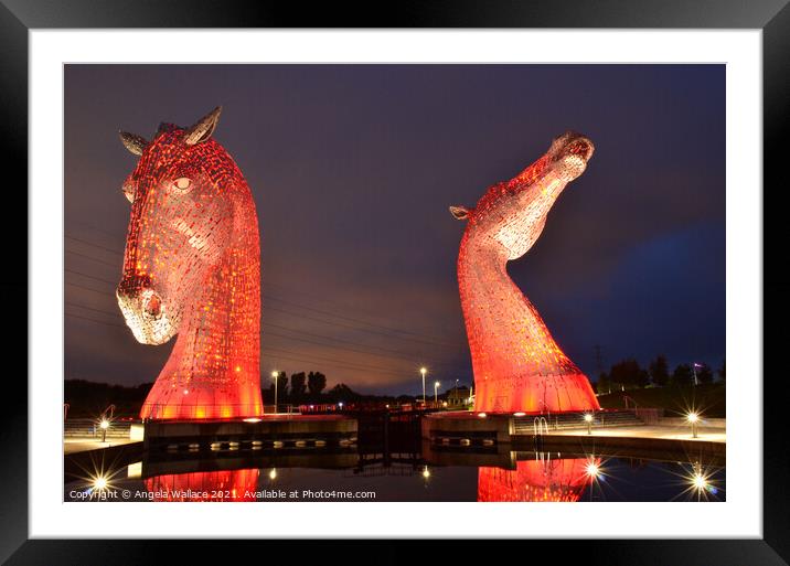 illuminated Kelpies with reflection Framed Mounted Print by Angela Wallace