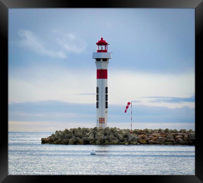 Lighthouse at Cannes Framed Print by Ann Biddlecombe
