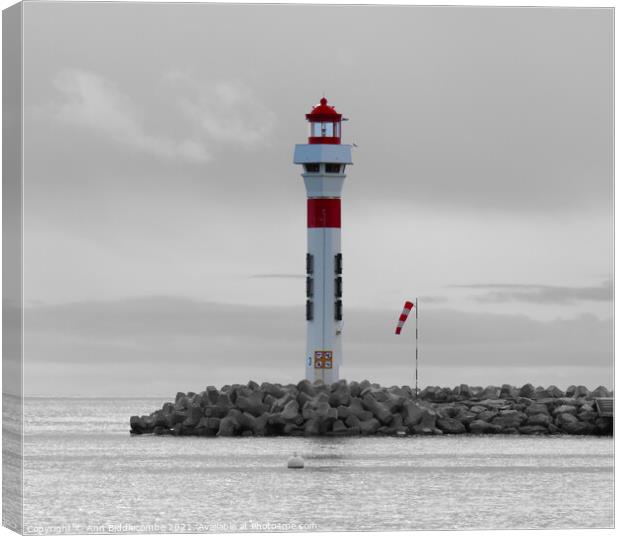 Lighthouse at Cannes with monochrome background Canvas Print by Ann Biddlecombe