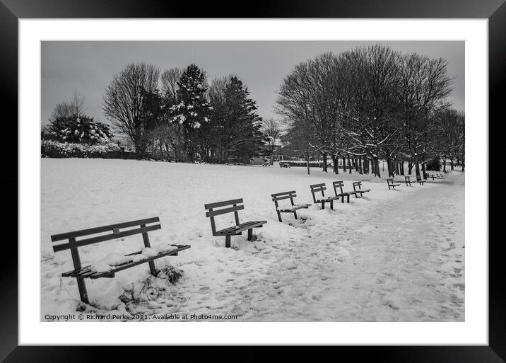 Seats in the snow Framed Mounted Print by Richard Perks
