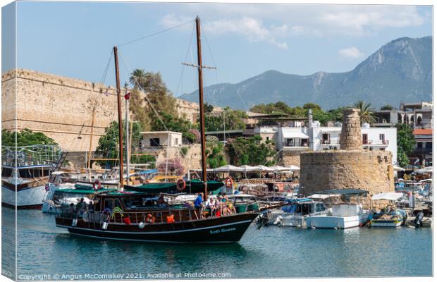 Gullet arriving at Kyrenia harbour Northern Cyprus Canvas Print by Angus McComiskey