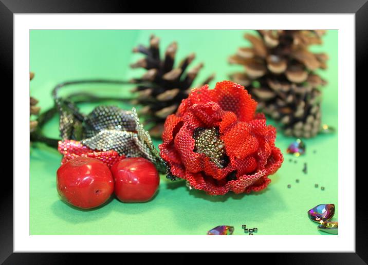 beaded poppy decoration on a green background Framed Mounted Print by Andrei Babchanok