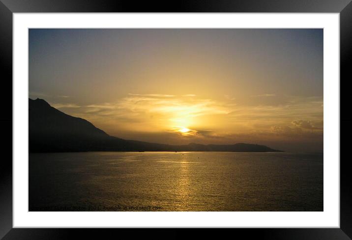 Mediterranean sunset off the coast of Capri, Italy. Framed Mounted Print by Peter Bolton