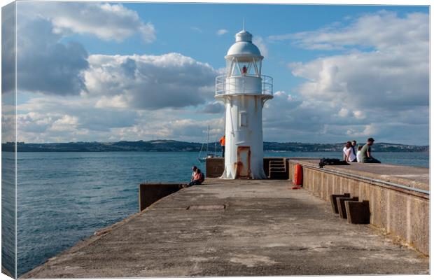 Brixham Jetty and Lighthouse Canvas Print by Wendy Williams CPAGB