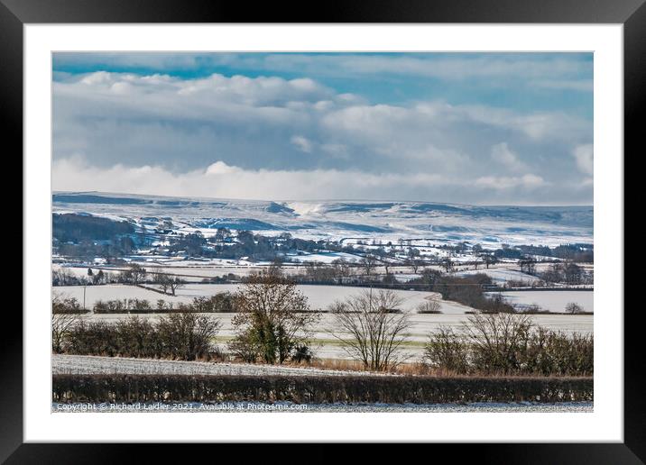 Winter sun on Barningham, Teesdale in the snow Framed Mounted Print by Richard Laidler