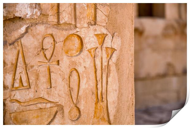 Egyptian hieroglyphs at the Mortuary Temple of Hatshepsut in Luxor, Egypt Print by Mirko Kuzmanovic