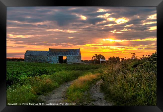 Glowing Sunrise on Farm Track Framed Print by Peter Thomas