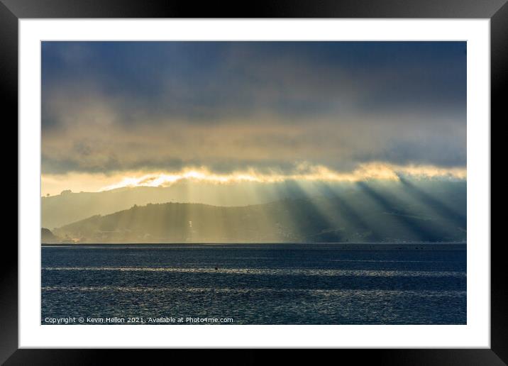 Sun rays and rainstorms on the Otago Peninsular Framed Mounted Print by Kevin Hellon