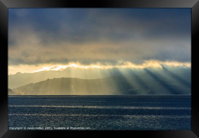 Sun rays and rainstorms on the Otago Peninsular Framed Print by Kevin Hellon