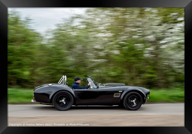 Roaring through the countryside The AC Cobra Framed Print by Martin Yiannoullou