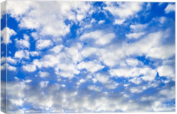 Fluffy White Clouds Canvas Print by Geoff Smith