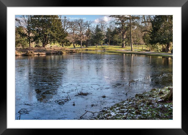 Ice on the lake Framed Mounted Print by Kevin White