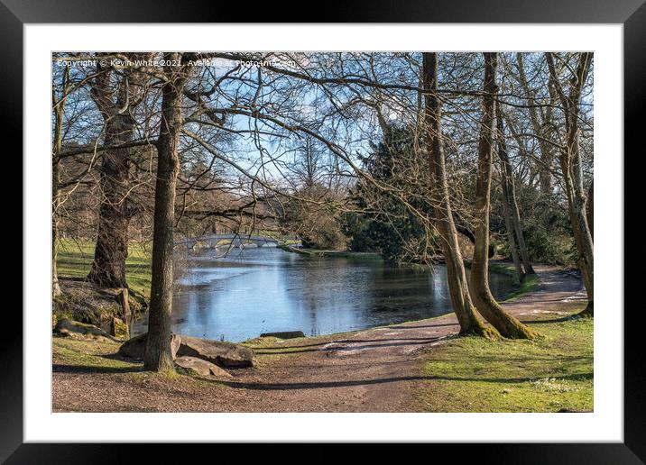 looking across pond to bridge Framed Mounted Print by Kevin White