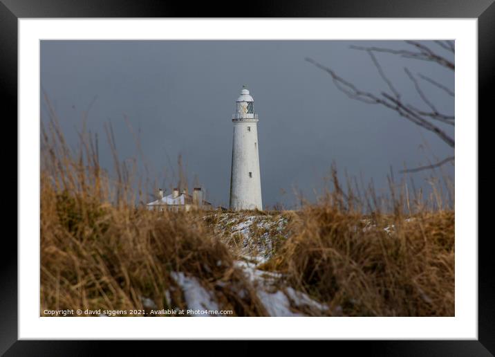 St Marys lighthouse snow  Framed Mounted Print by david siggens