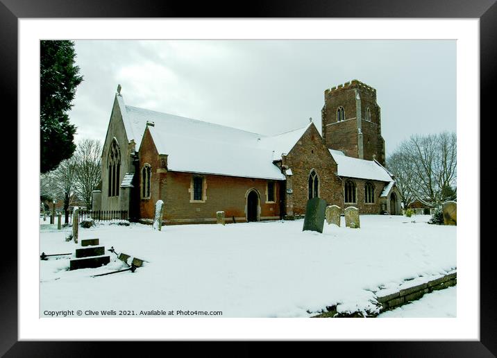 St. Faiths Church covered in snow Framed Mounted Print by Clive Wells