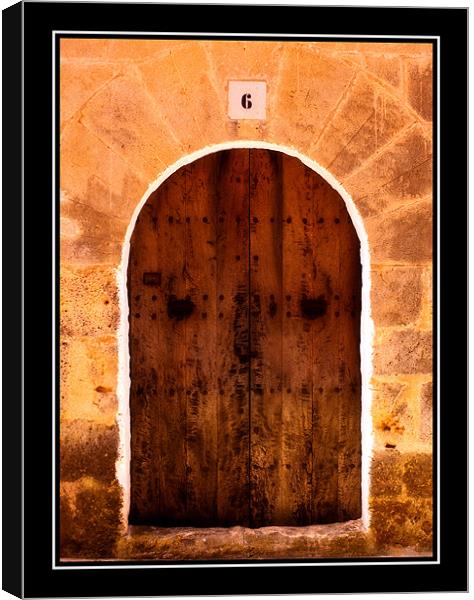 Old Doorway Mallorca Canvas Print by Simon Litchfield