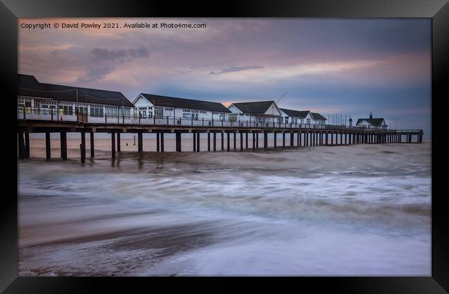 Dawn colour over Southwold Pier Framed Print by David Powley