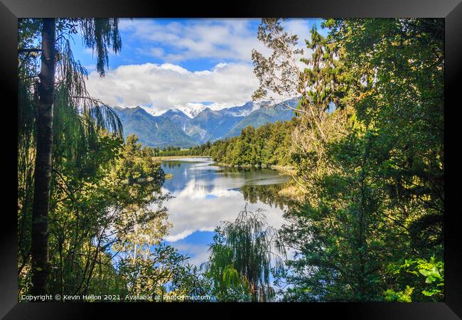 View over Lake Matheson with Mount Cook in the bac Framed Print by Kevin Hellon