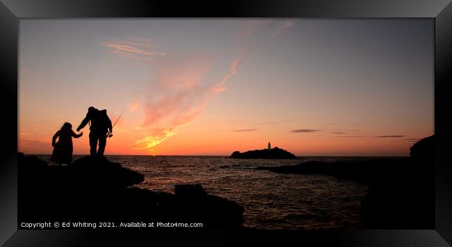 Fisherman in Godrevy lighthouse sunset Framed Print by Ed Whiting