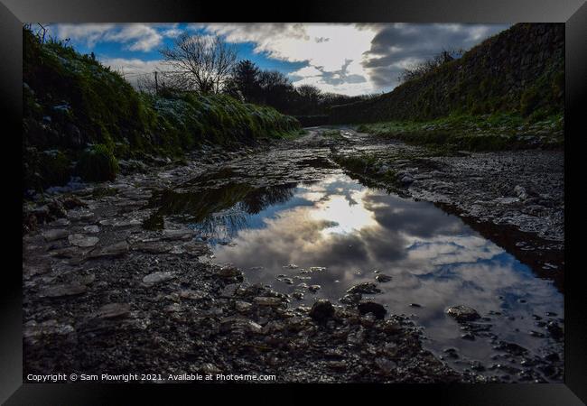 Reflection off of a puddle at Carn Marth Framed Print by Sam Plowright