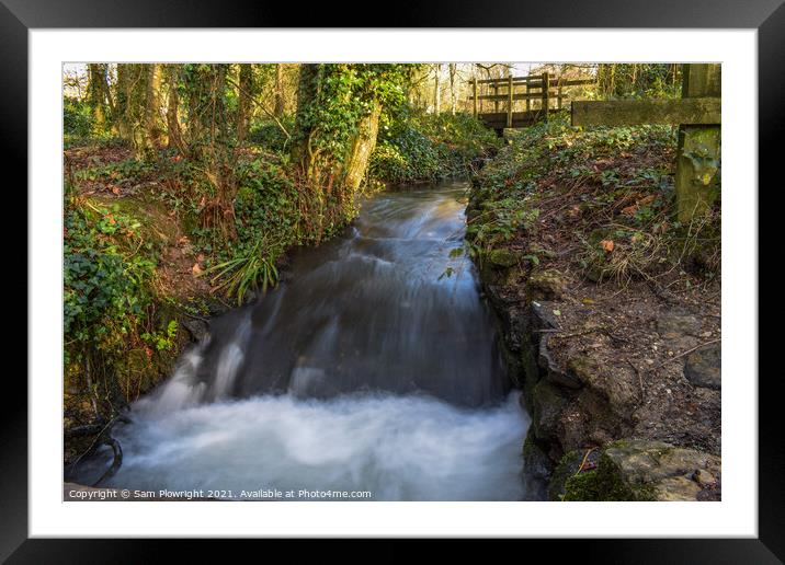 Waterfall flowing under a bridge at Tehidy woods Framed Mounted Print by Sam Plowright