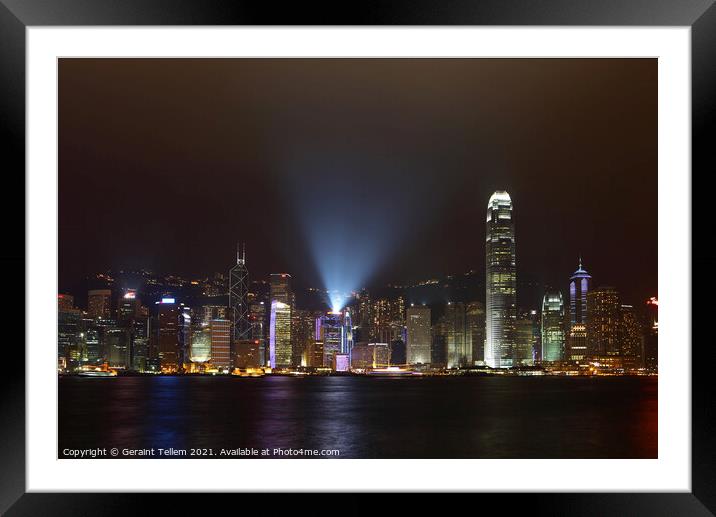 Hong Kong Island, Victoria Harbour waterfront including Two International Finance Centre, Hong Kong. Symphony of Lights display Framed Mounted Print by Geraint Tellem ARPS