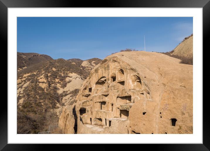 Ancient Cliff Dwellings of Guyaju Caves in China Framed Mounted Print by Mirko Kuzmanovic