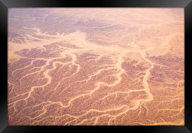 Aerial airplane view of barren Sahara desert landscape in Egypt Framed Print by Mirko Kuzmanovic