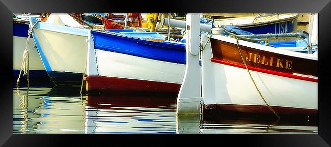 Colourful fishing boats Framed Print by Andy Wager