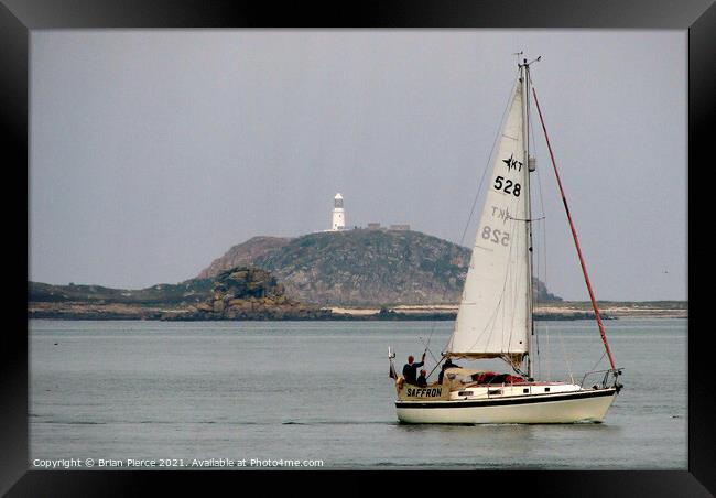 Sailing past St Martin's, Isles of Scilly Framed Print by Brian Pierce