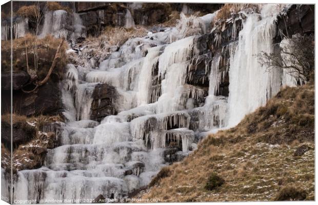 Frozen waterfall at Brecon Beacons, South Wales Canvas Print by Andrew Bartlett
