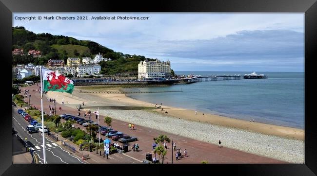 Llandudno Grand Pier with the Welsh flag Framed Print by Mark Chesters