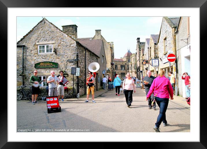 Street buskers at Bakewell in Derbyshire. Framed Mounted Print by john hill
