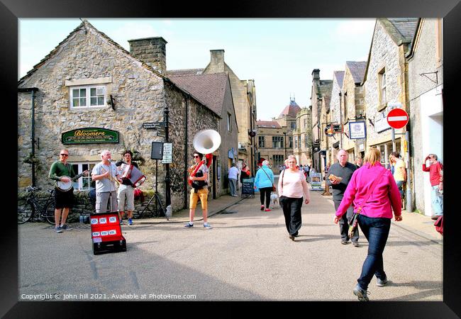Street buskers at Bakewell in Derbyshire. Framed Print by john hill