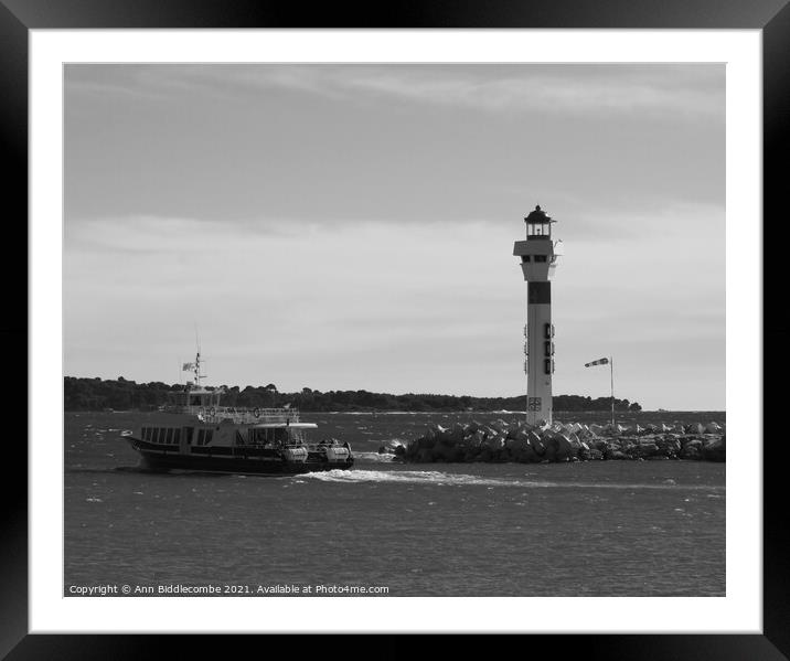 Ferry and lighthouse in monochrome Framed Mounted Print by Ann Biddlecombe