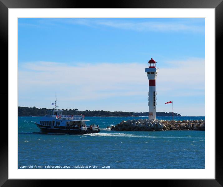 Ferry and lighthouse in cannes Framed Mounted Print by Ann Biddlecombe