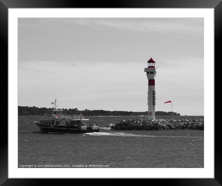 Ferry and lighthouse in cannes in monochrome and red Framed Mounted Print by Ann Biddlecombe