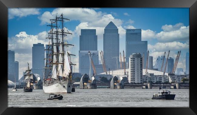  sailing  ship Dar Mlodziezy and canary wharf  Framed Print by tim miller