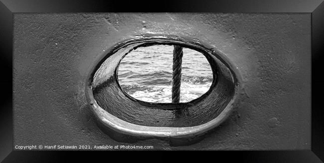 Bull´s eye in a blue iron wall from a ship. 1bw Framed Print by Hanif Setiawan