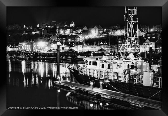 Black and white photograph of Whitby harbour at ni Framed Print by Stuart Chard