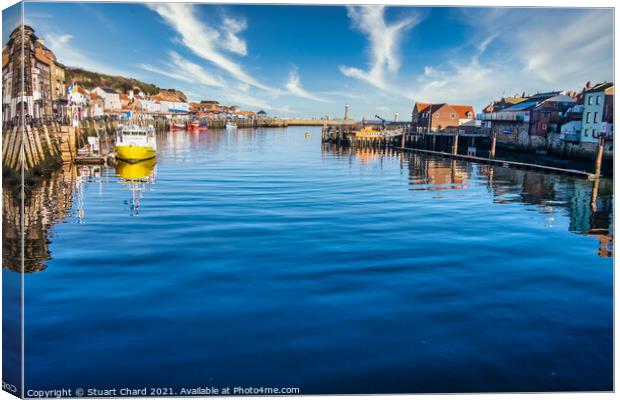 Scenic view of Whitby harbour at sunrise Canvas Print by Stuart Chard