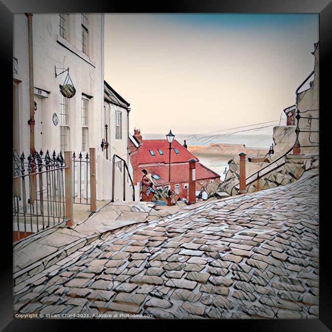 Whitby town cobbled streets and seaview Framed Print by Stuart Chard